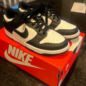 Nike Dunk Low.  “Panda Dunks”